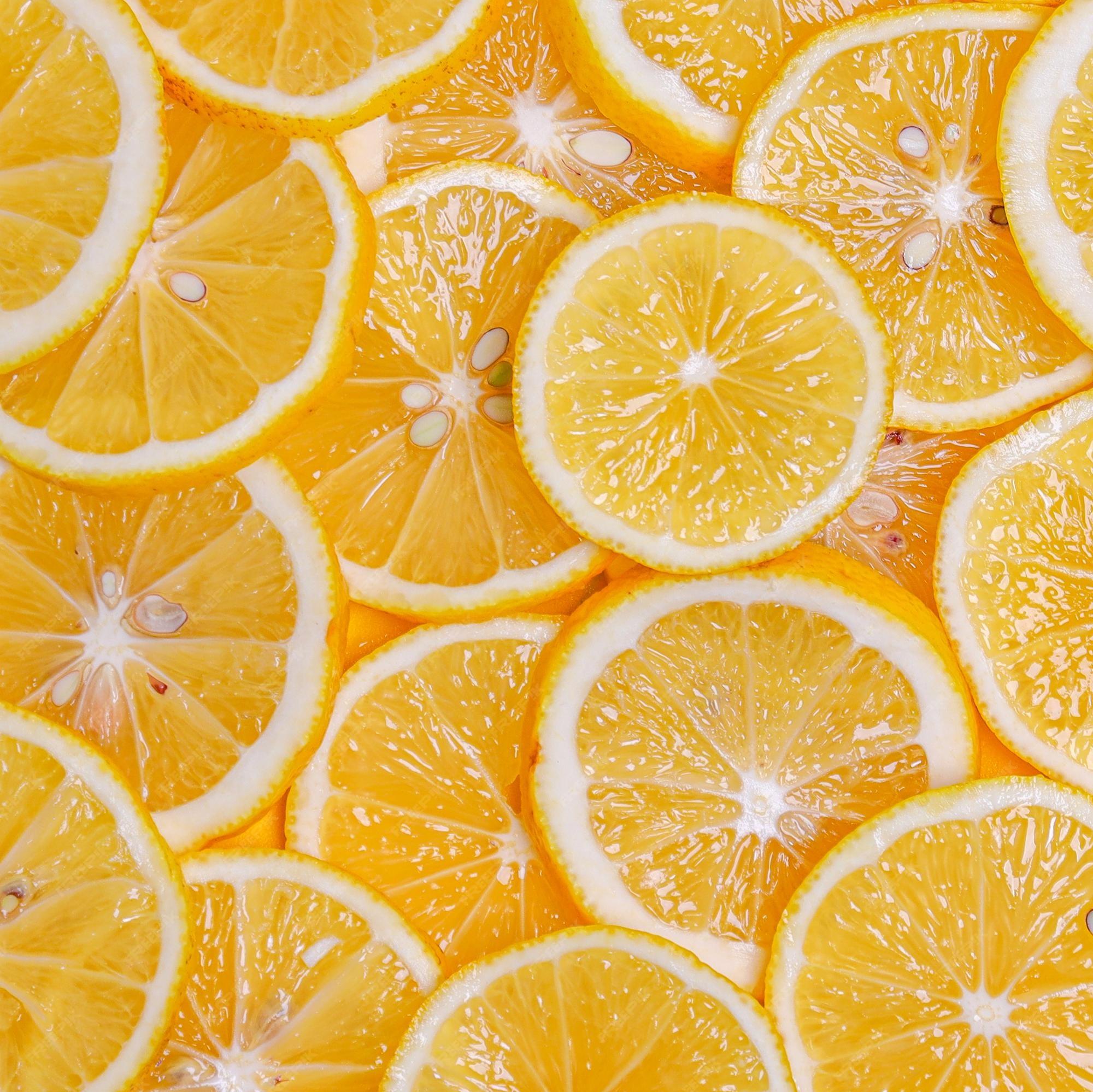 Premium Photo Yellow Lemon Slices Pattern Texture Background