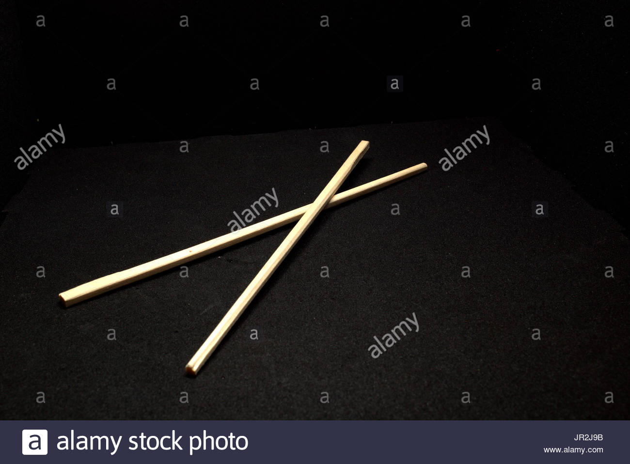 A Set Of Disposable Chopsticks On Black Background Part