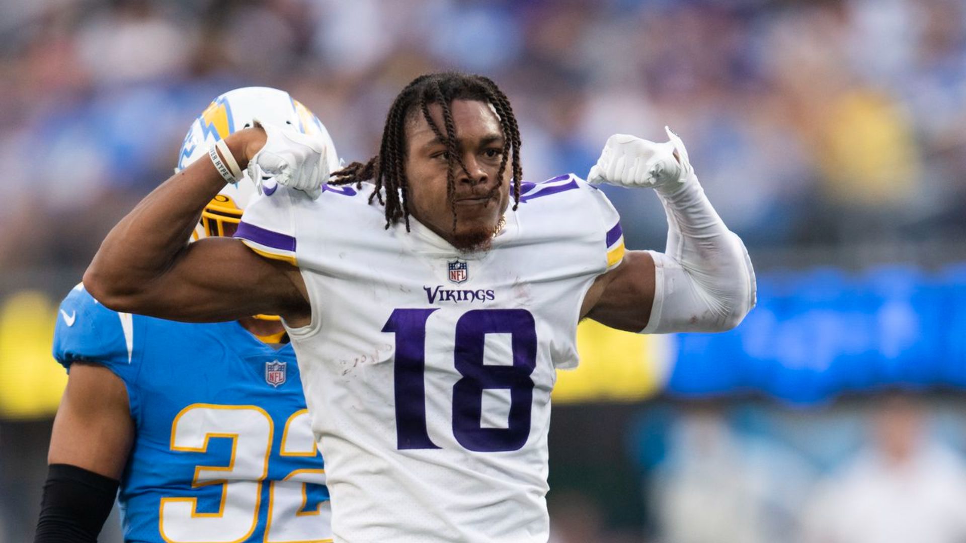 Minnesota Vikings wide receiver Justin Jefferson flexing during an NFL game
