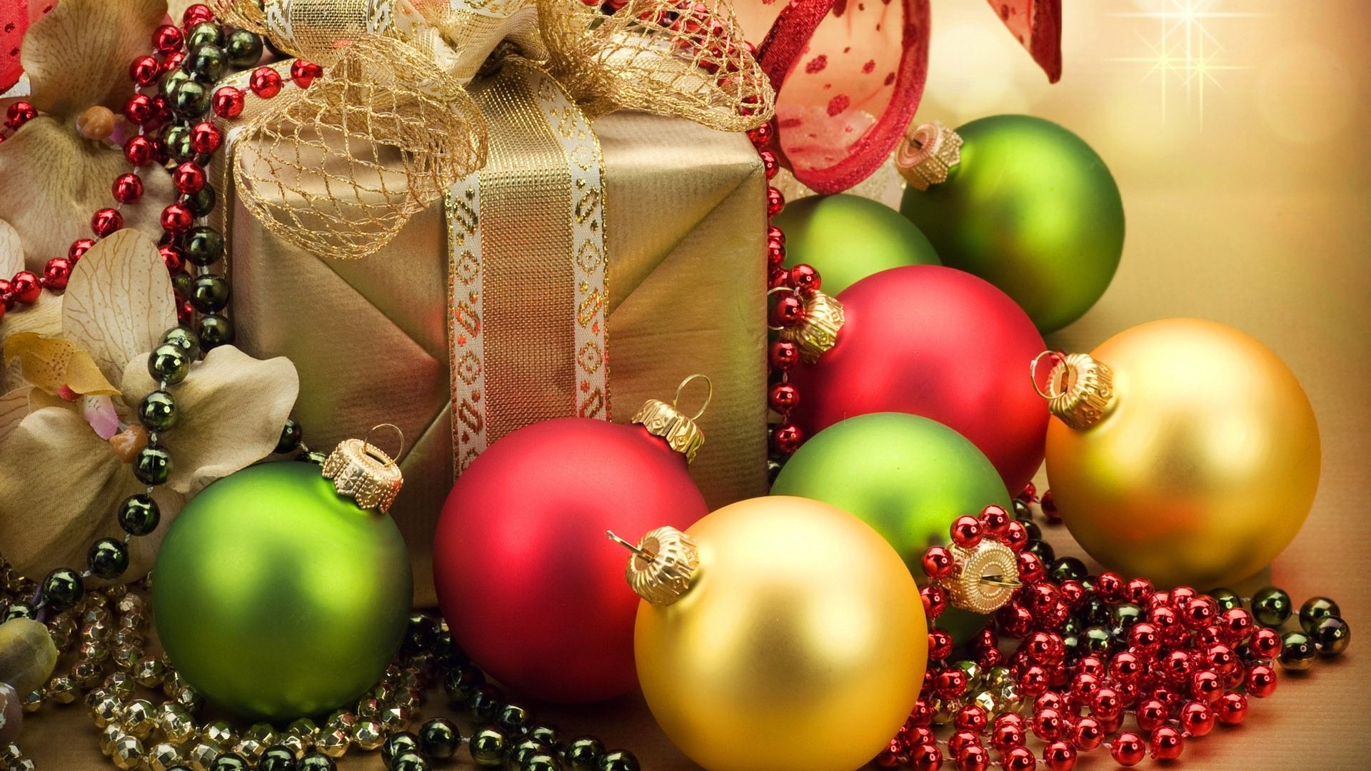 Festive Christmas still life with ornaments, gift, and beads