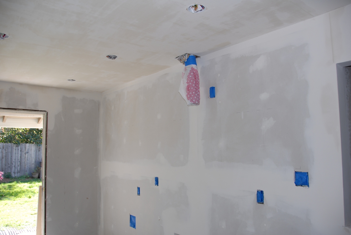 Can I skim coat over my painted popcorn ceiling 