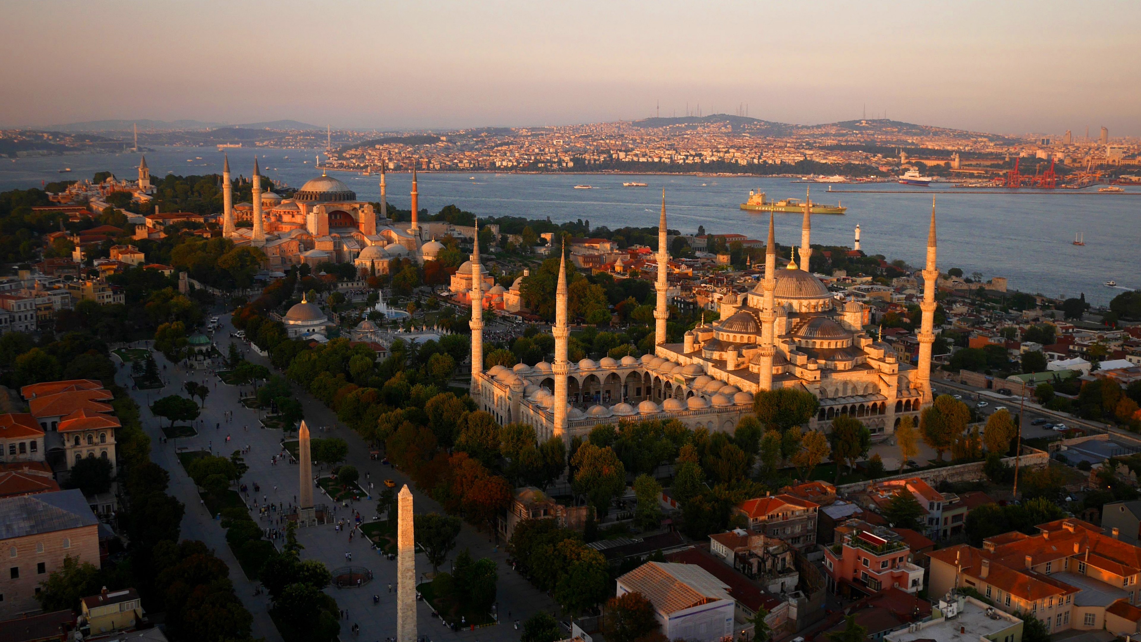 Aerial view of Istanbul at sunset showcasing Hagia Sophia and the Blue Mosque