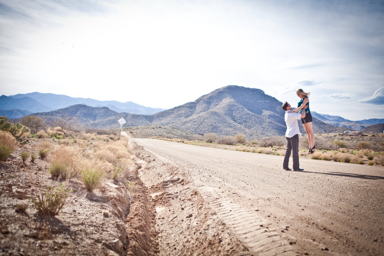  in Arizona desert with sprawling mountains in background OneWedcom 1500x1000
