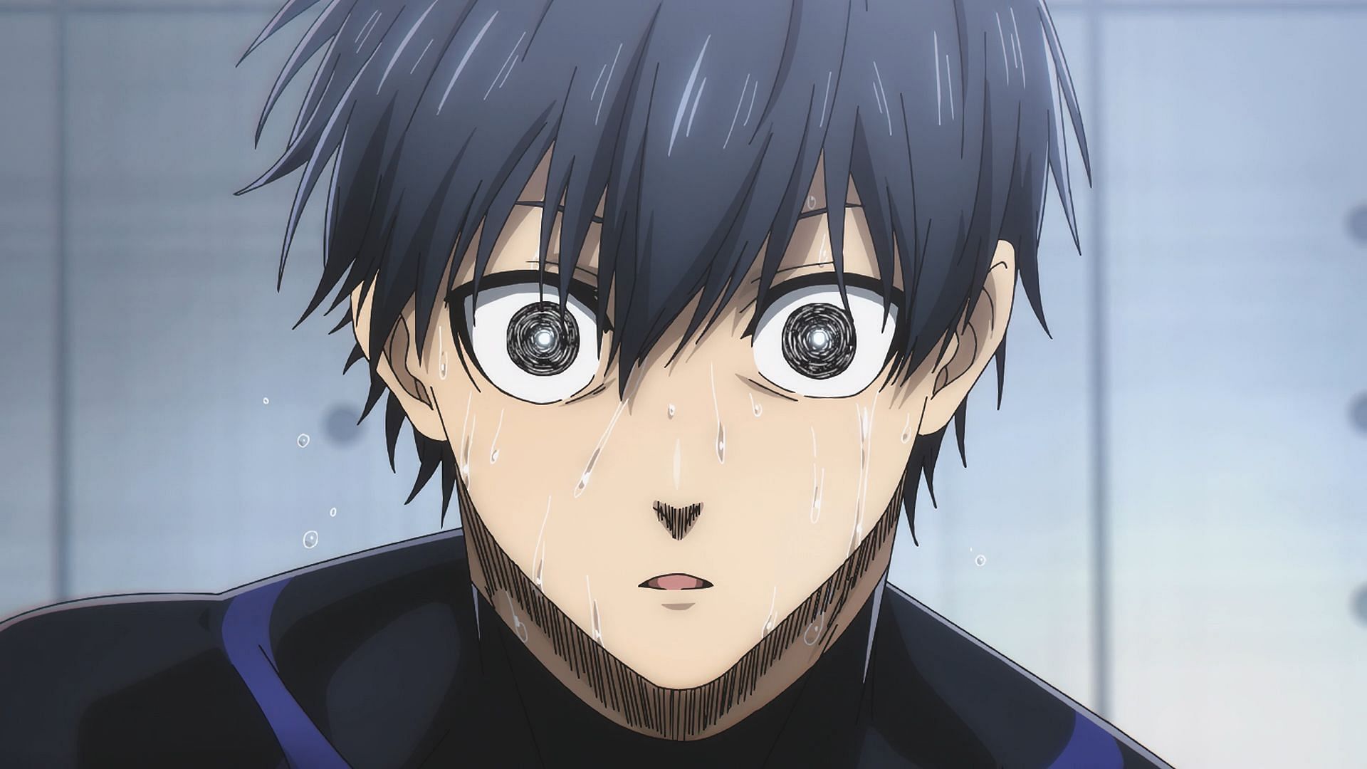 Close-up of Isagi Yoichi's face, sweating and with a determined expression, from the anime 'Blue Lock'