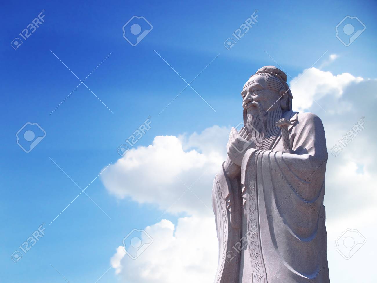 Confucius Statue With Sky Background Stock Photo Picture And