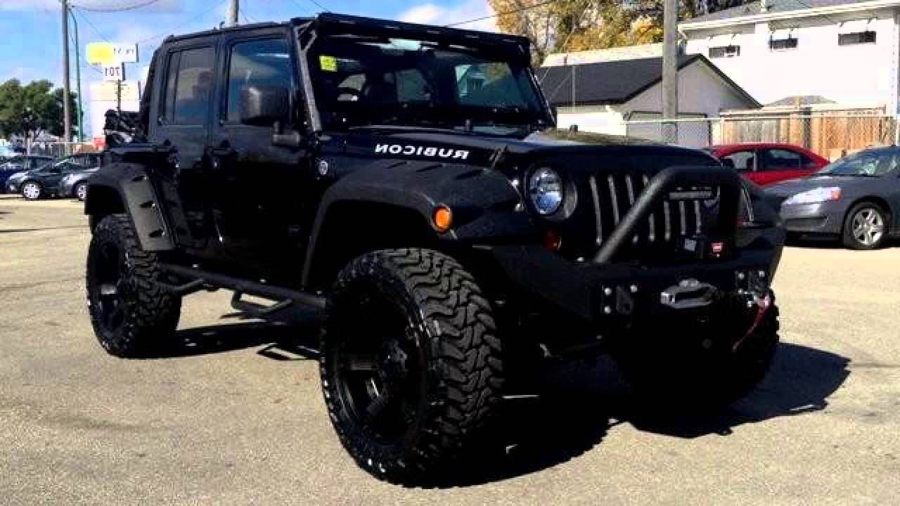 Lifted Jeep Wrangler Mudding Rubicon White