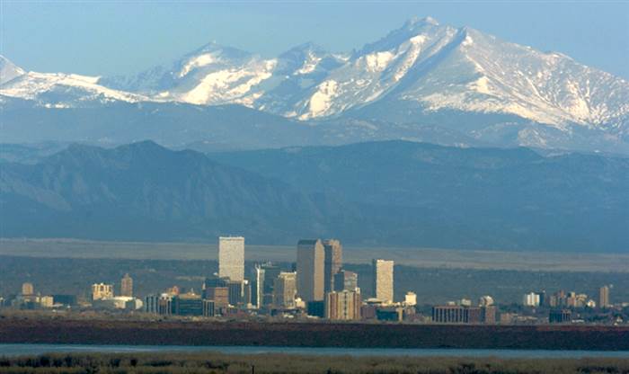 Denver skyline with the front range peaks of the Rocky Mountains 700x416