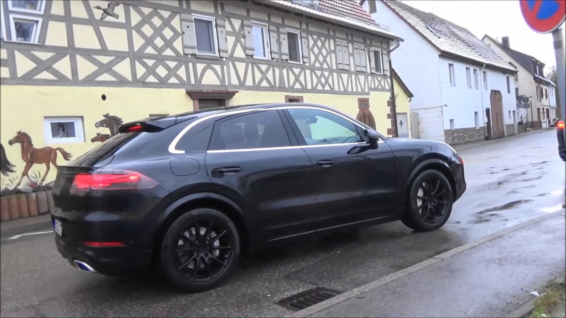 Watch Porsche Cayenne Coupe Get Stalked On A Rainy Day