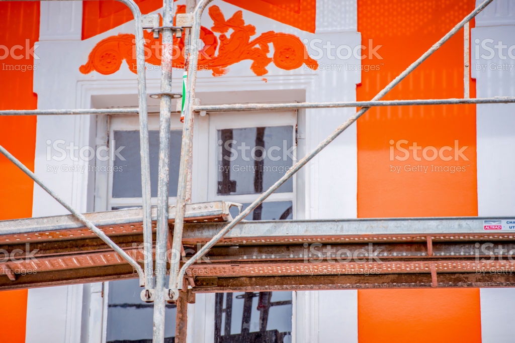 Free download Painters Scaffold With Orange House In The Background