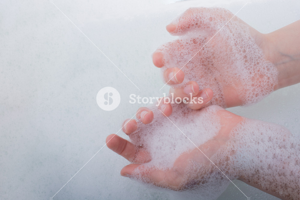 Hand Washing And Soap Foam On A Foamy Background Royalty