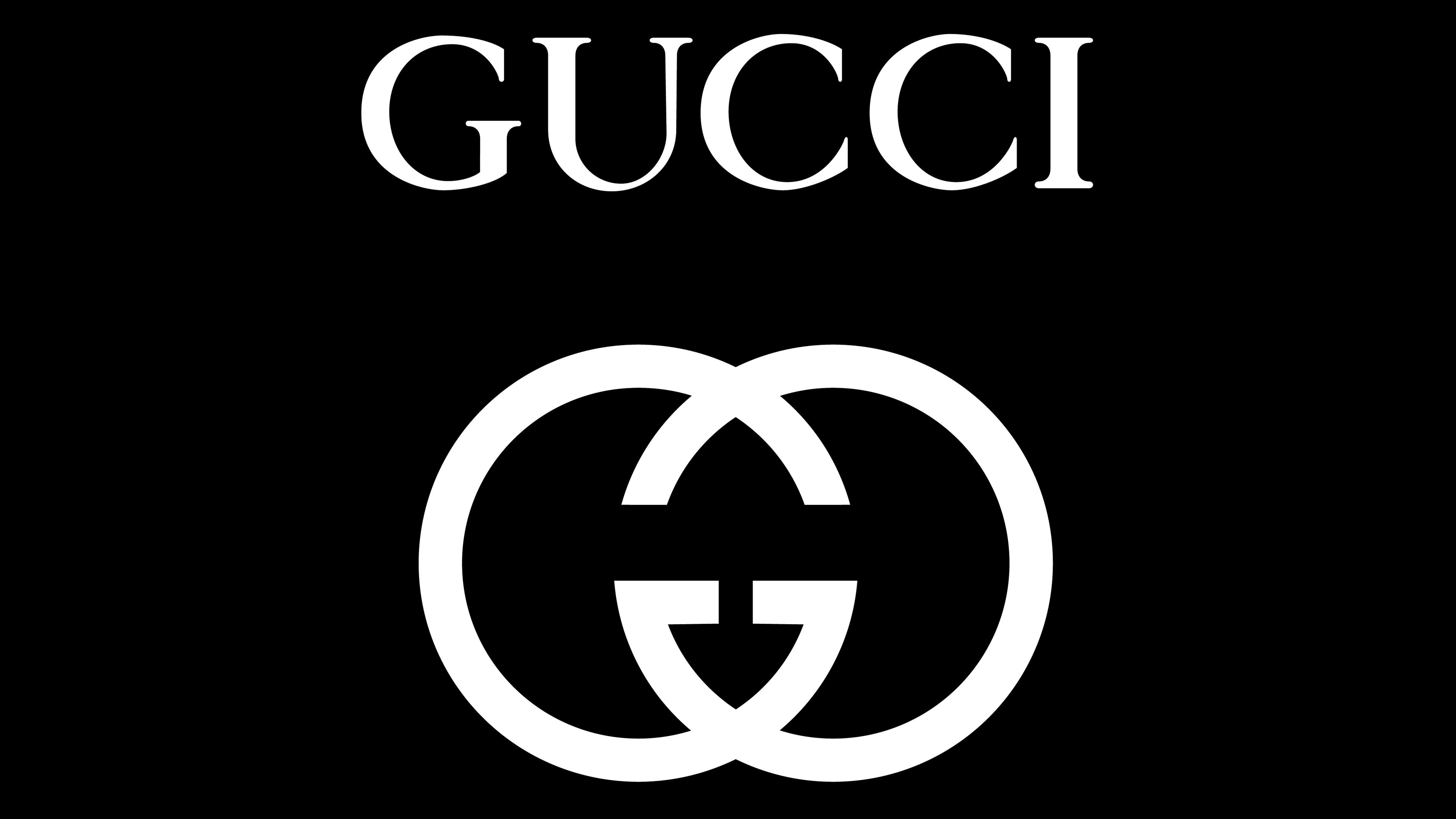 Gucci logo on a black background