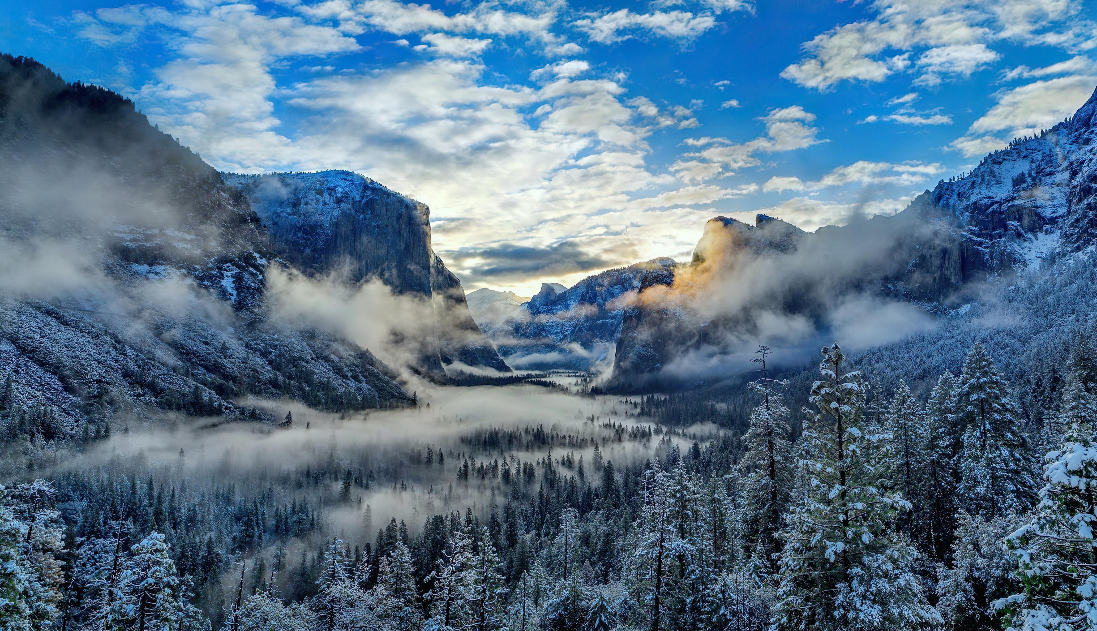 Fog And Clouds Over Snowy Winter Mountain 4k WallpaperHD Nature