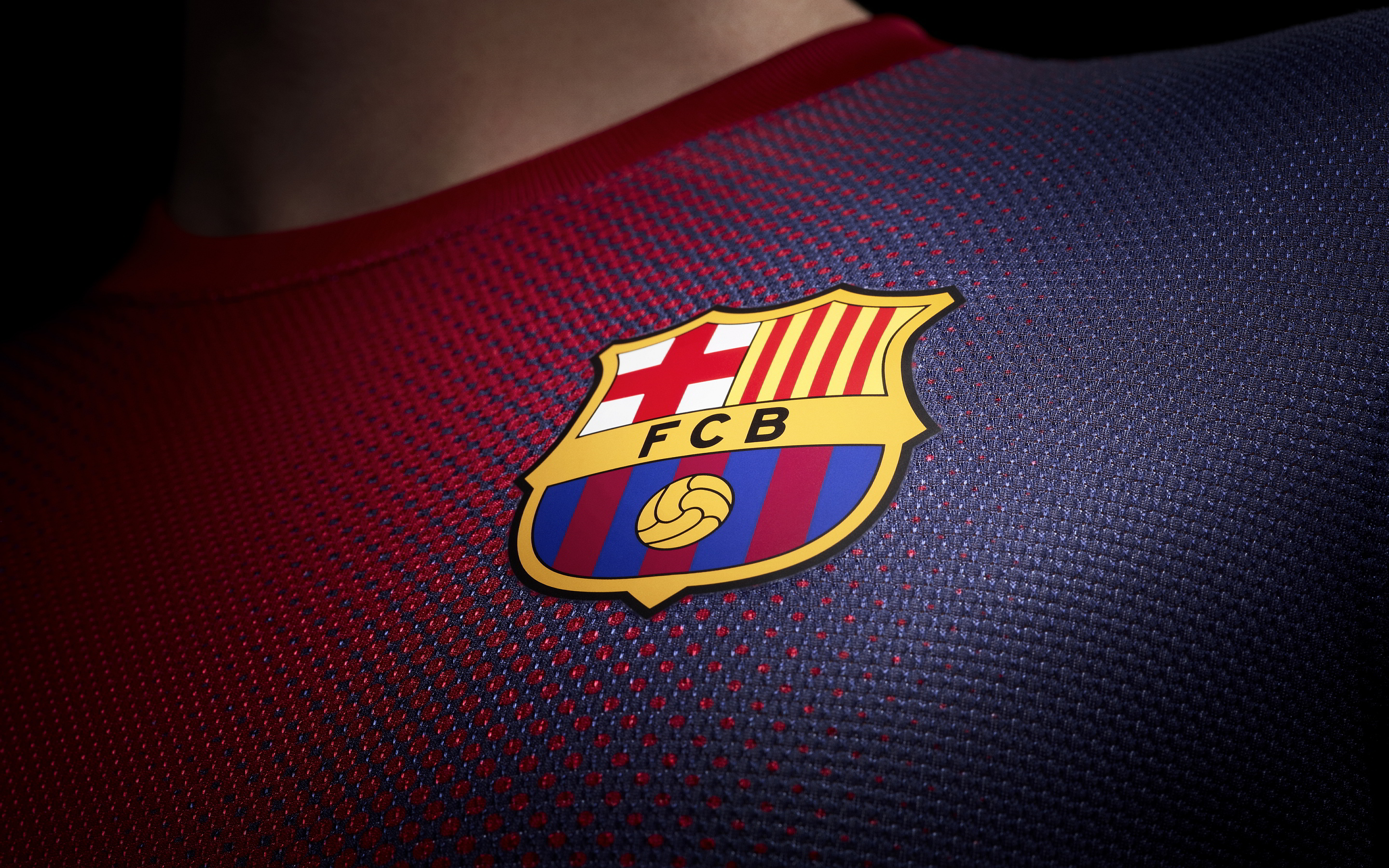 Close-up of FC Barcelona's jersey featuring the club crest