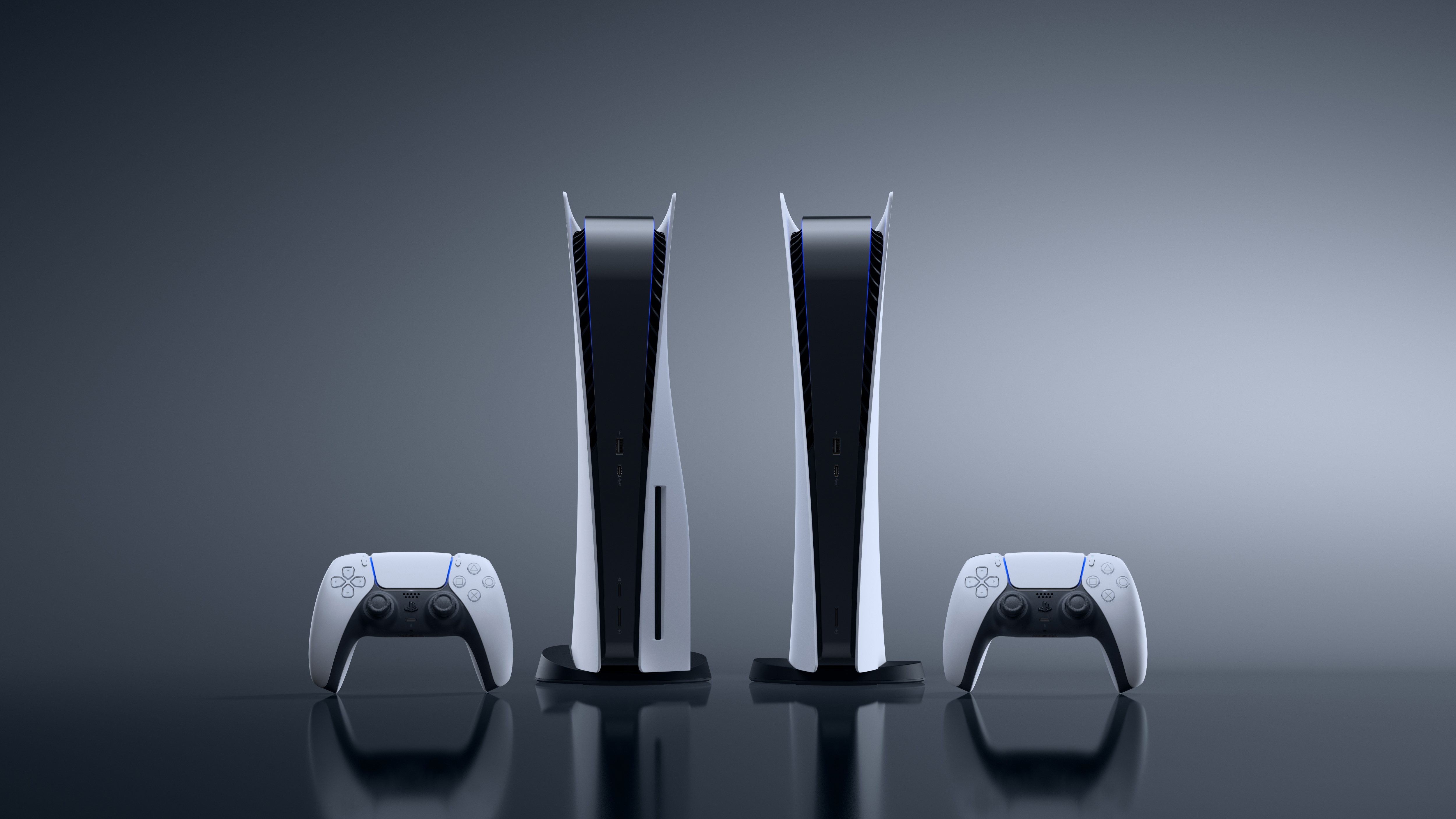 Two PlayStation 5 consoles stand side-by-side with their DualSense controllers, showcasing the sleek design of Sony's next-gen gaming system