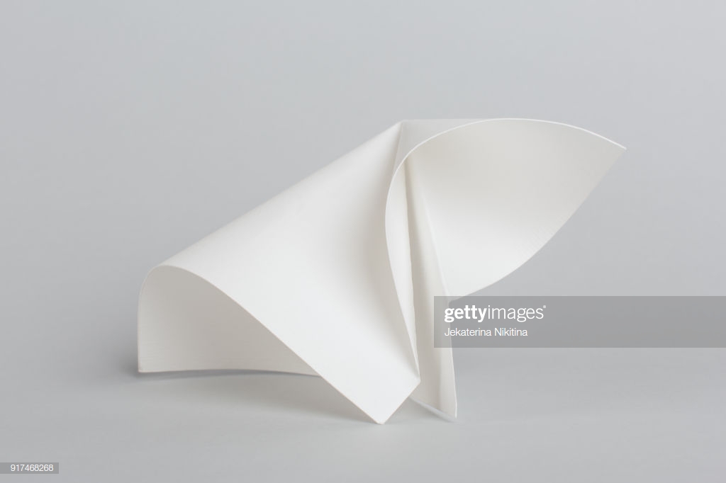 Folded Sheet Of Paper Against Gray Background Stock Photo Getty