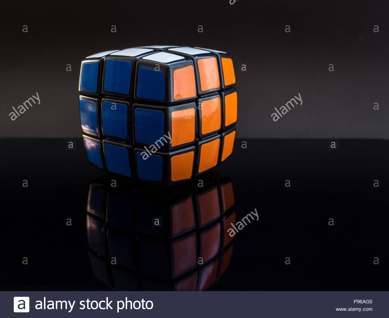 Round Rubik S Cube On Black Background With Reflection Studio