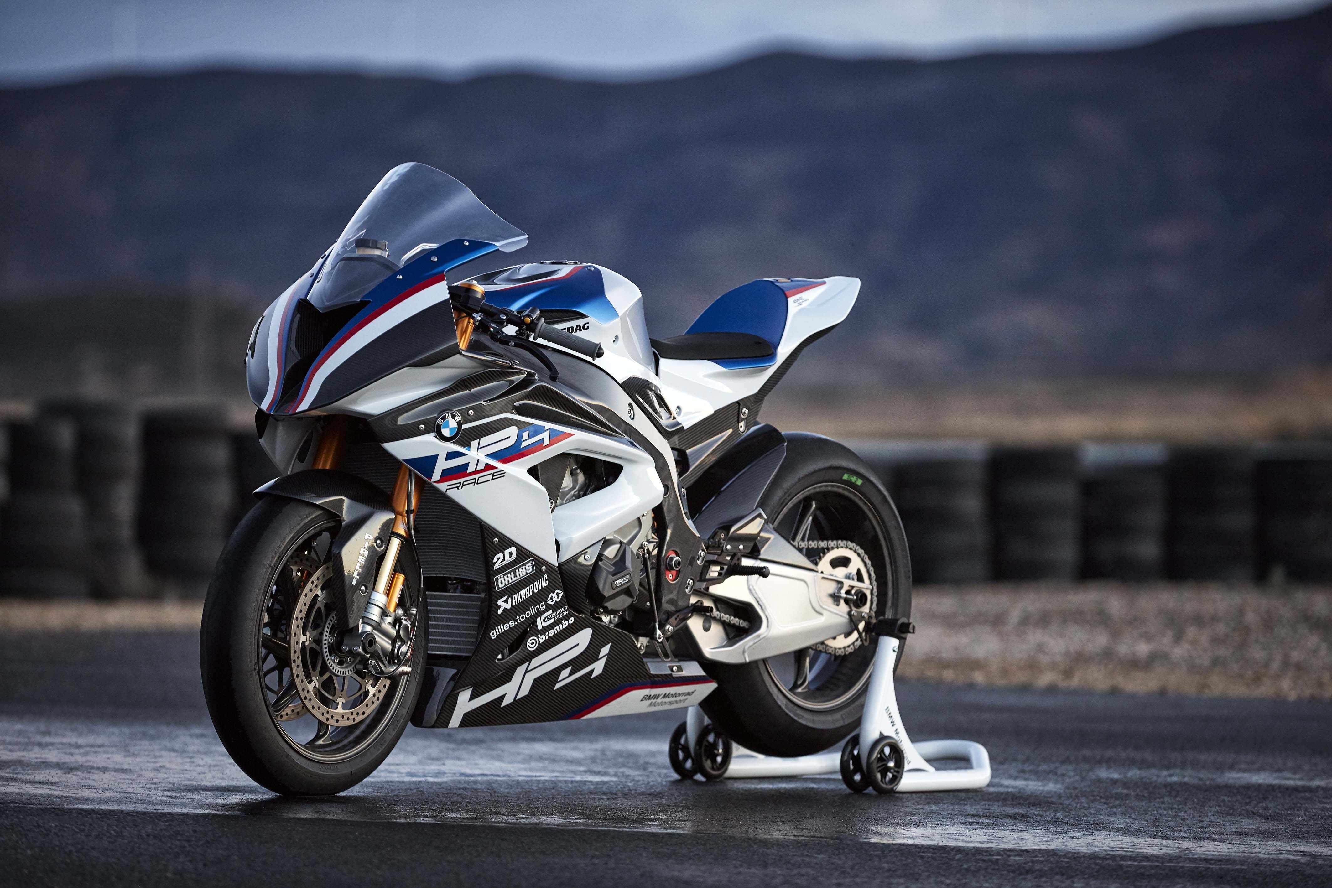 Depth of field photography of white and blue HP4 sport bike HD