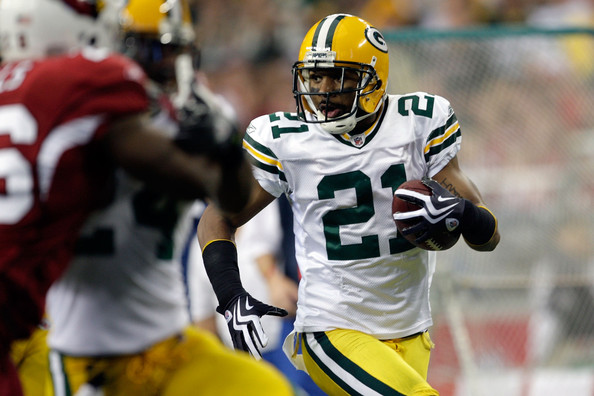 Charles Woodson Of The Green Bay Packers Runs For