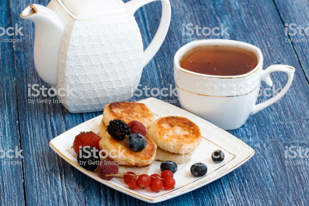 Cottage Cheese Pancakes On Blue Background Syrniki With Fresh