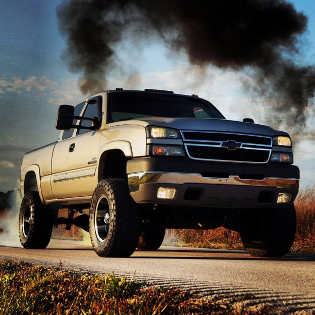 Black and White Photo of a Pick up Truck in Smoke  Free Stock Photo