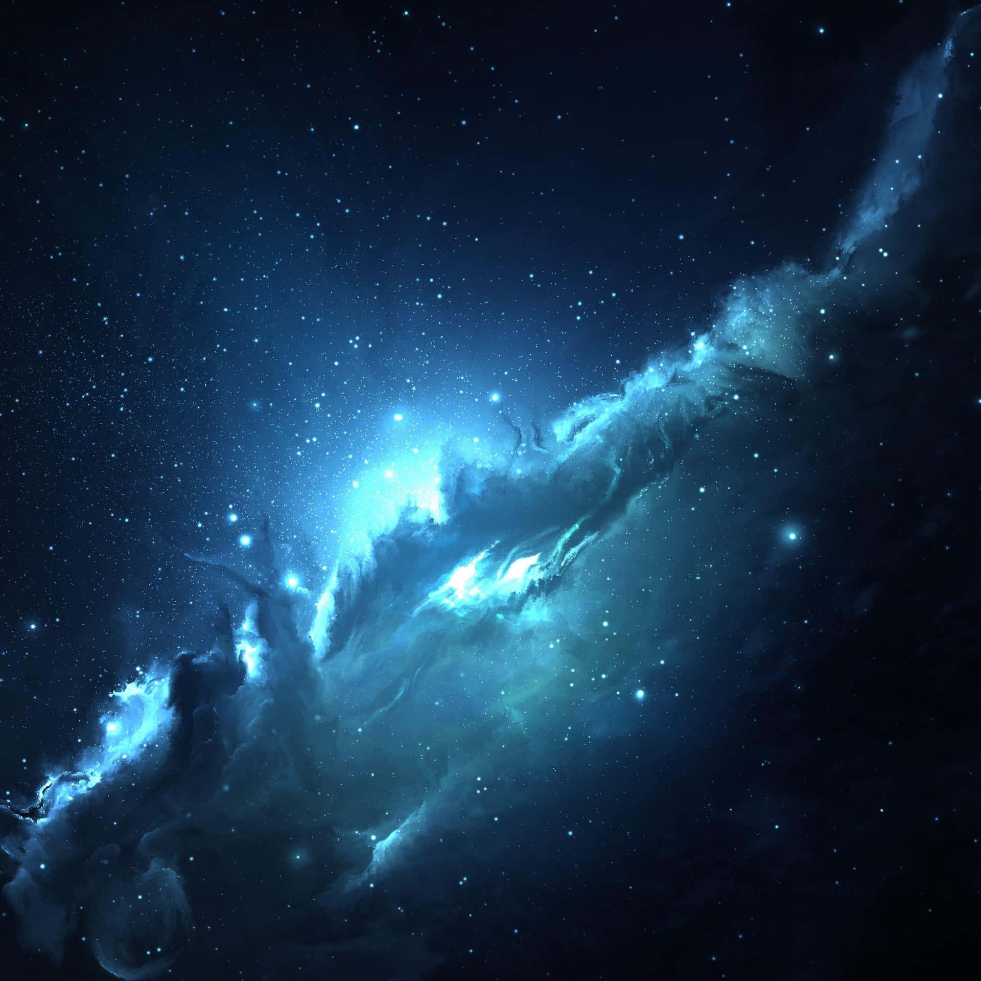 Download A Blue Space With Stars And Nebula