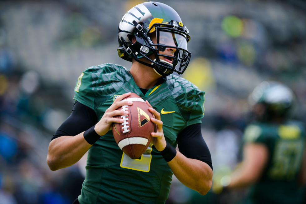 Sophomore Quarterback Marcus Mariota Warms Up Before Kickoff The