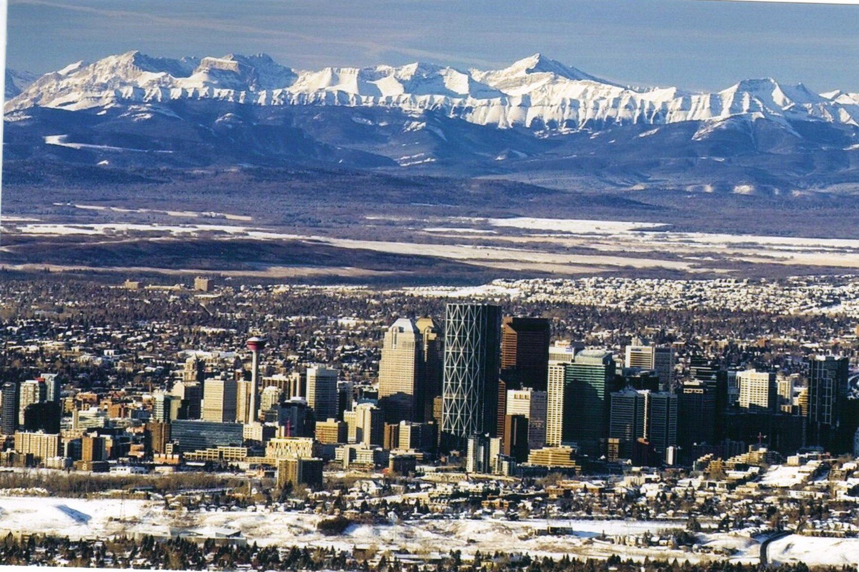 Calgary with the Rockies in the background Places to visit