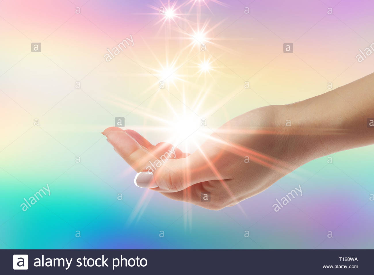 Healing Hands With Bright Sunburst On Rainbow Background Stock
