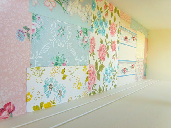  back panel being wallpaper with scrappy pieces of vintage wallpaper