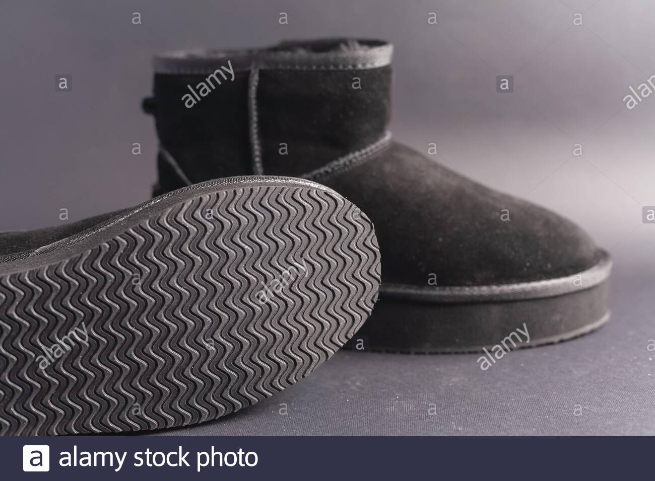 Free download Black suede uggs Stock photo on a black background Stock ...