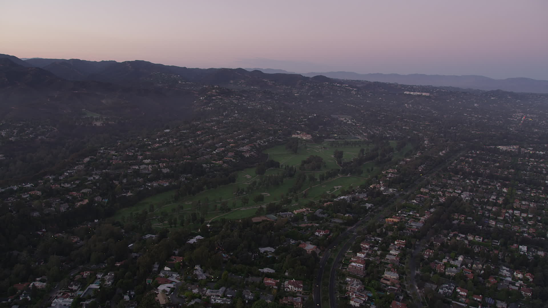 5k Stock Footage Aerial Video Approach A Golf Course And Mansions