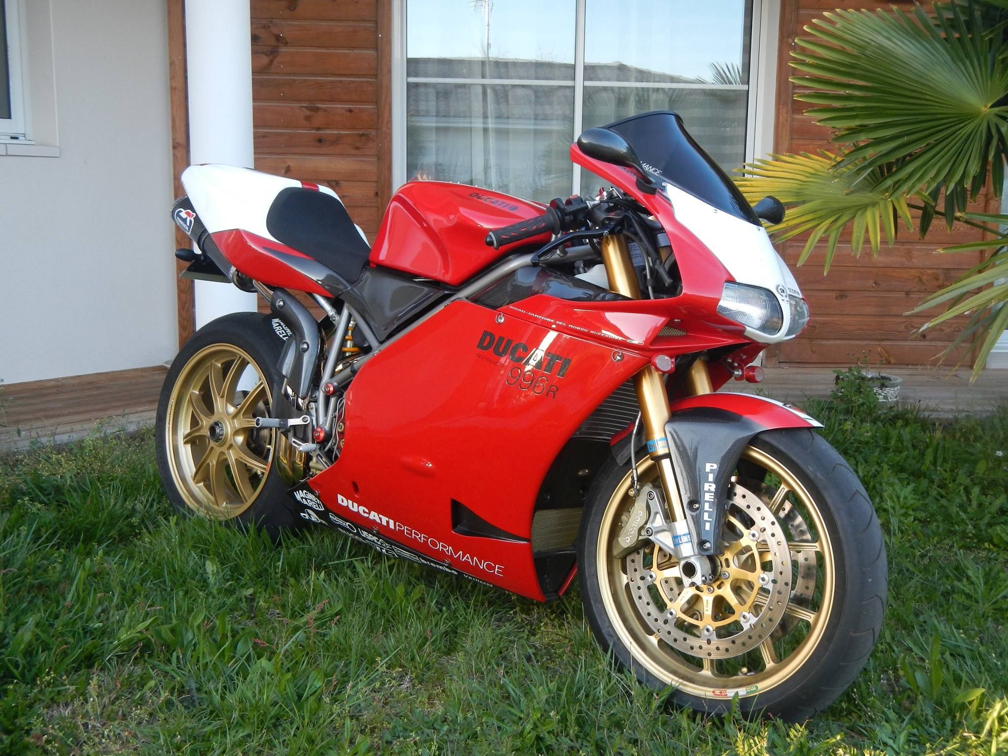Ducati 996R Motorcycle Parked on Grass