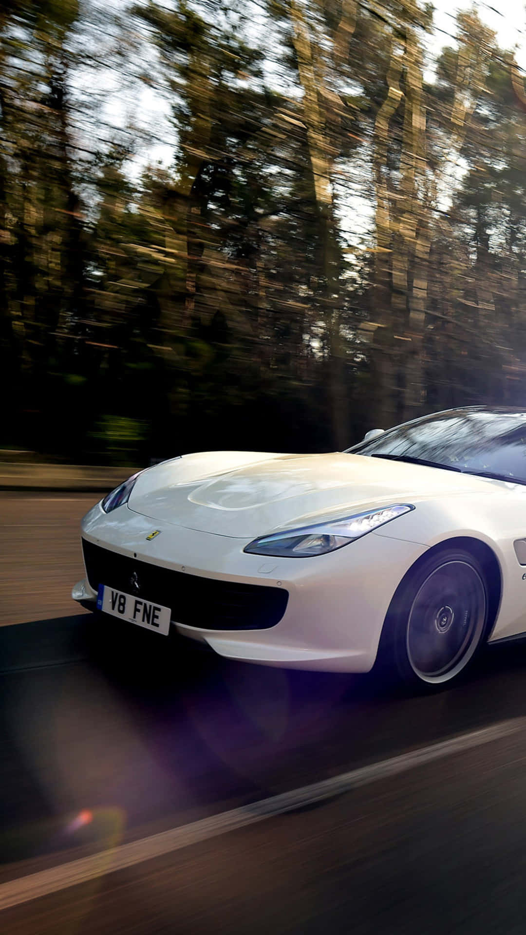 Add A Bit Of Luxury To Your Life With White Ferrari iPhone Wallpaper