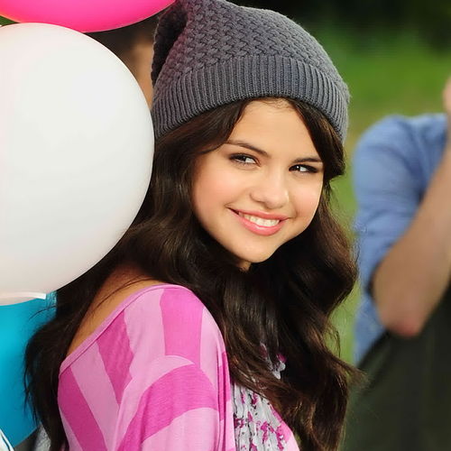 Selena Gomez And Balloons Wallpaper For iPhone 3g 3gs