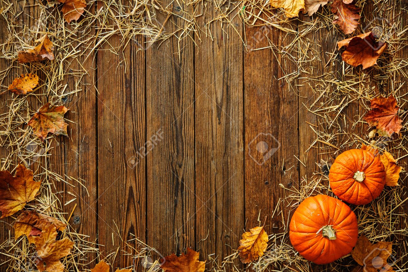 Harvest Or Thanksgiving Background With Gourds And Straw On A