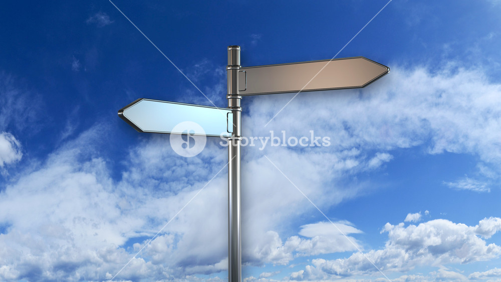 Directional Sign Two Blank Arrows On A Pole With The Blue Sky In