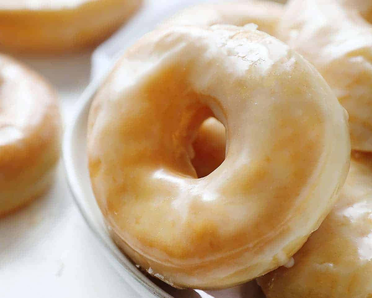 Delicious Glazed Donuts That Make Mornings Sweet Wallpaper