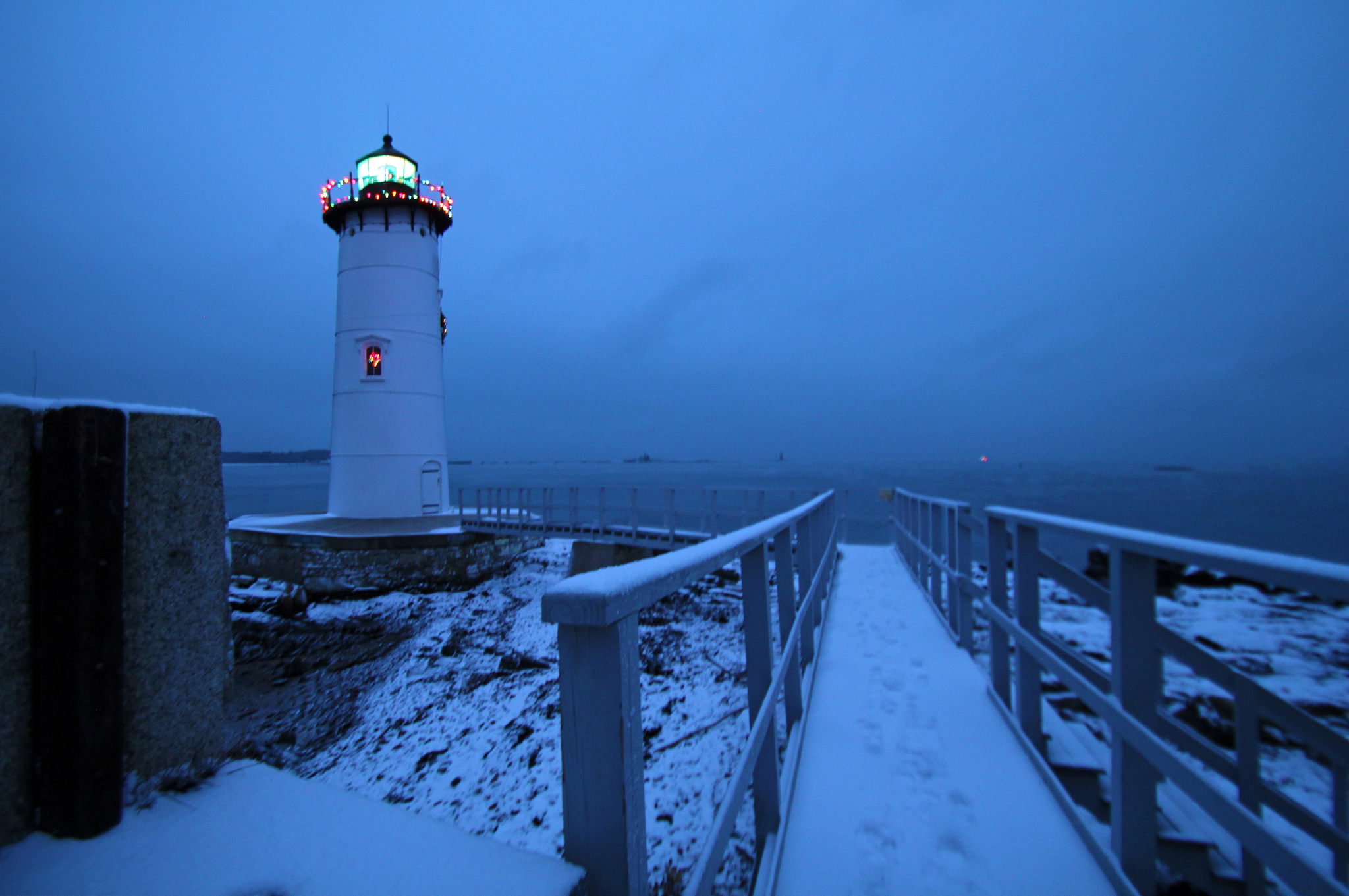 Lighthouse With Christmas Lights By Jeremy D Entremont