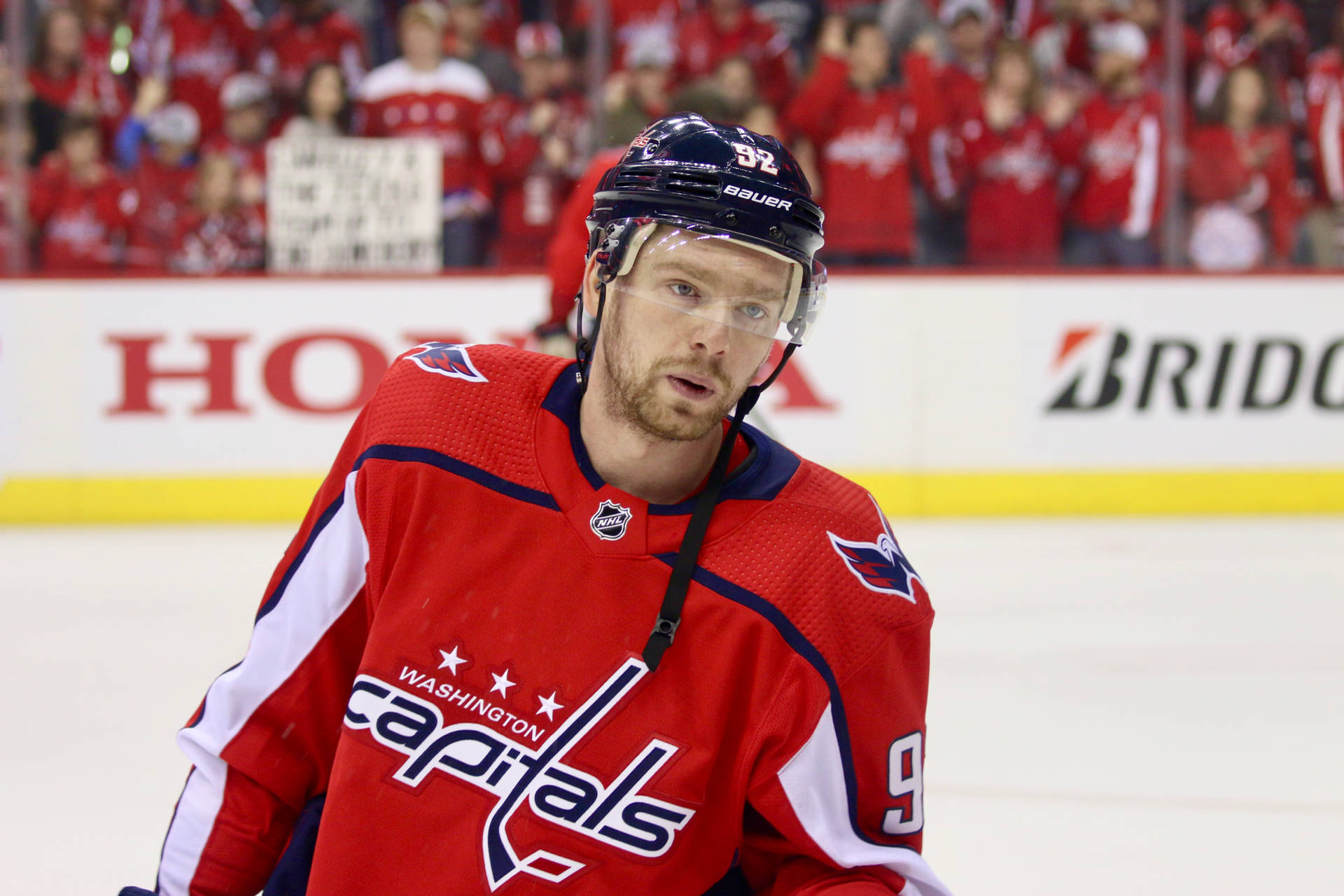 Russian Professional Hockey Star Evgeny Kuznetsov In Action Wallpaper