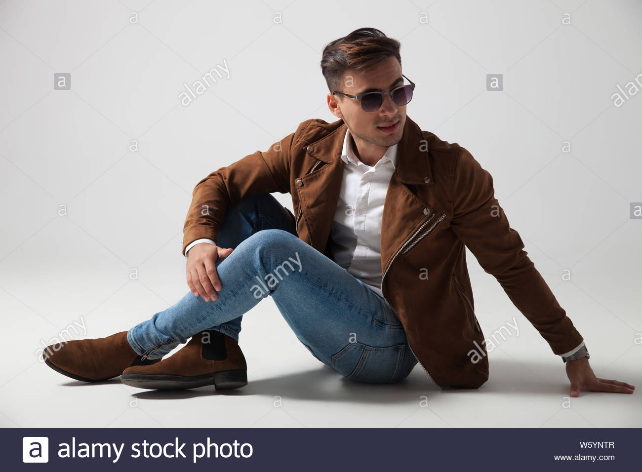 Free download fashion man lying down and looks back over shoulder ...