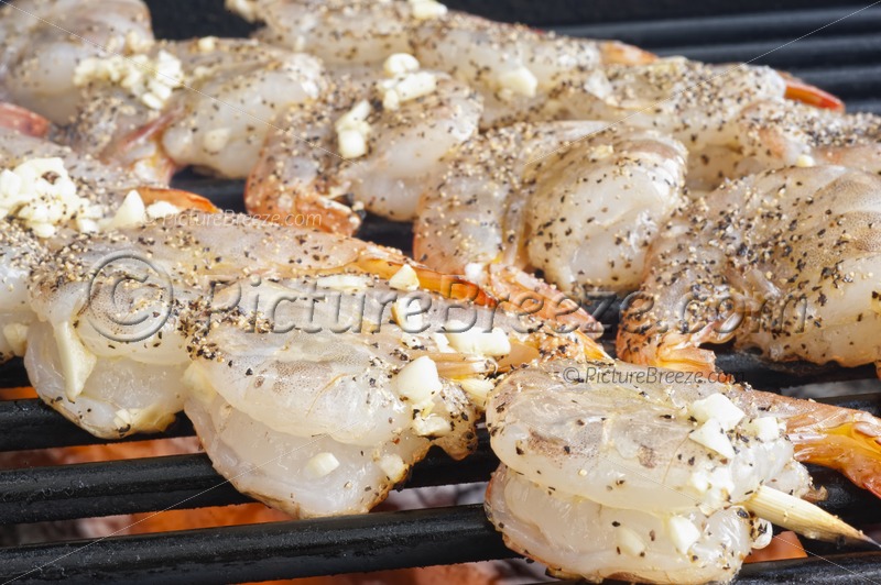 Grilling Seafood Shrimps On Barbecue Grill Stock Photos At