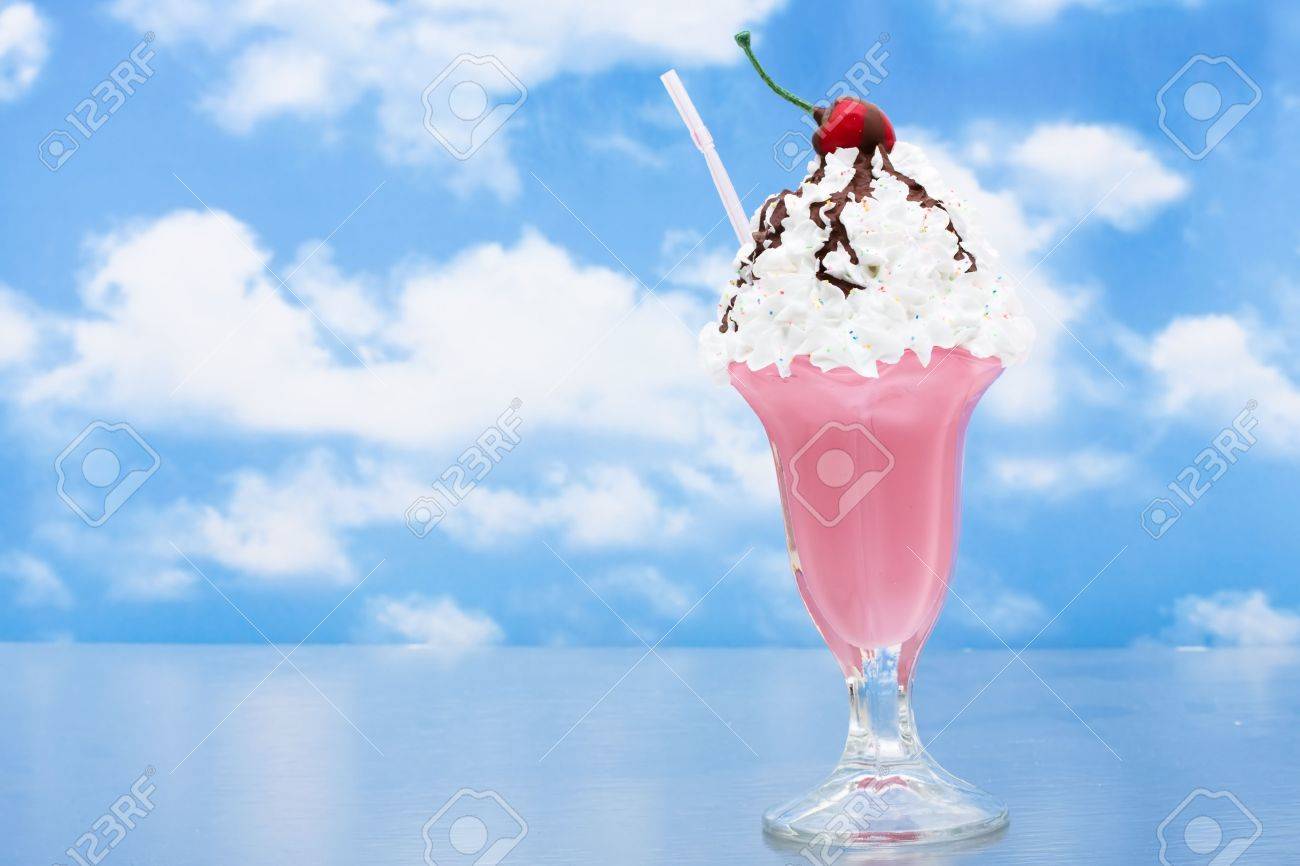 An Ice Cream Sundae On A Sky Background Stock