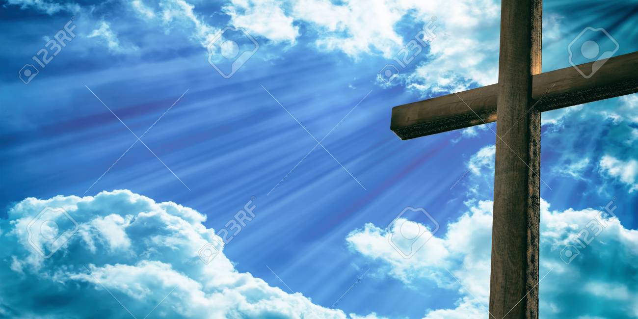 Crucifixion Of Jesus Christ Wooden Cross On Blue Sky Background