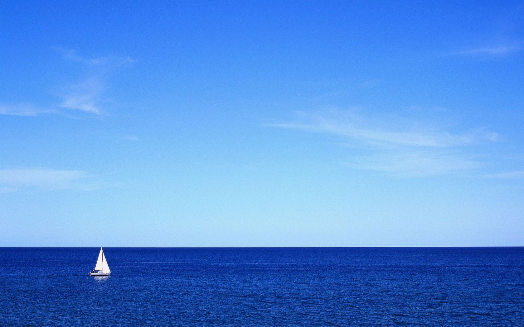 Sailing Boat In The Distance Wallpaper