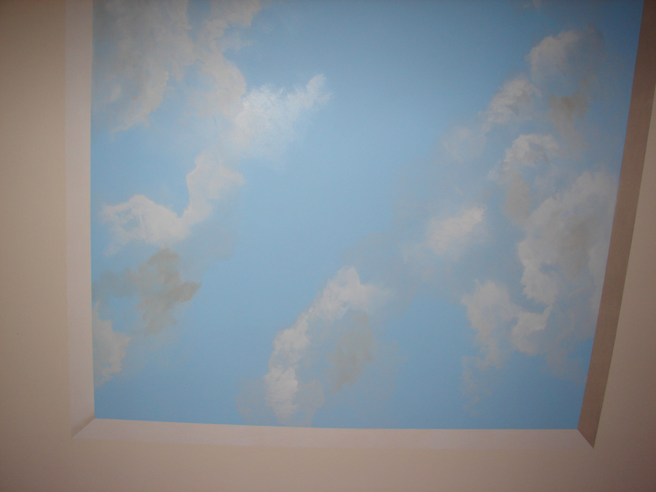 Trompe l oeil Cloud Scene looking as if the ceiling was opened up
