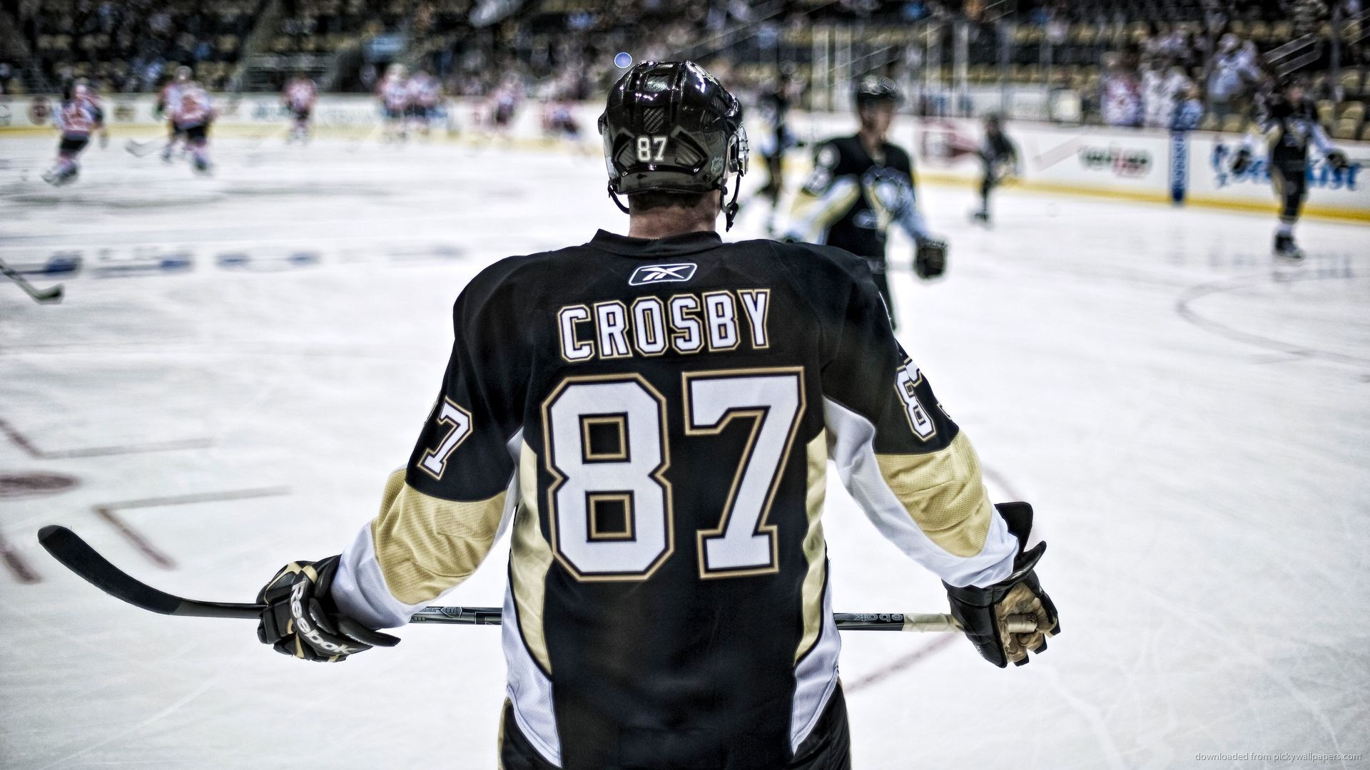 Sidney Crosby, captain of the Pittsburgh Penguins, stands on the ice during an NHL hockey game