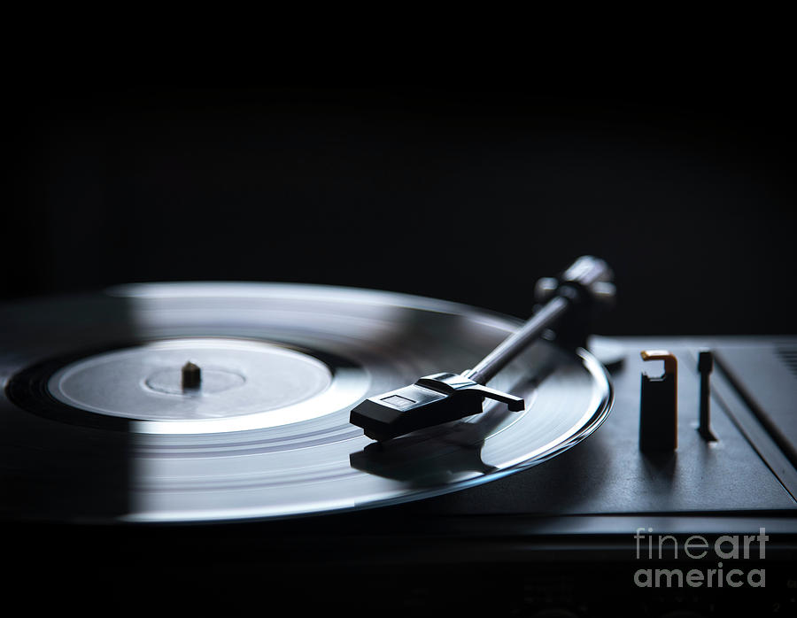 Retro Gramophone Vinyl Player Over Black Background With Copyspa
