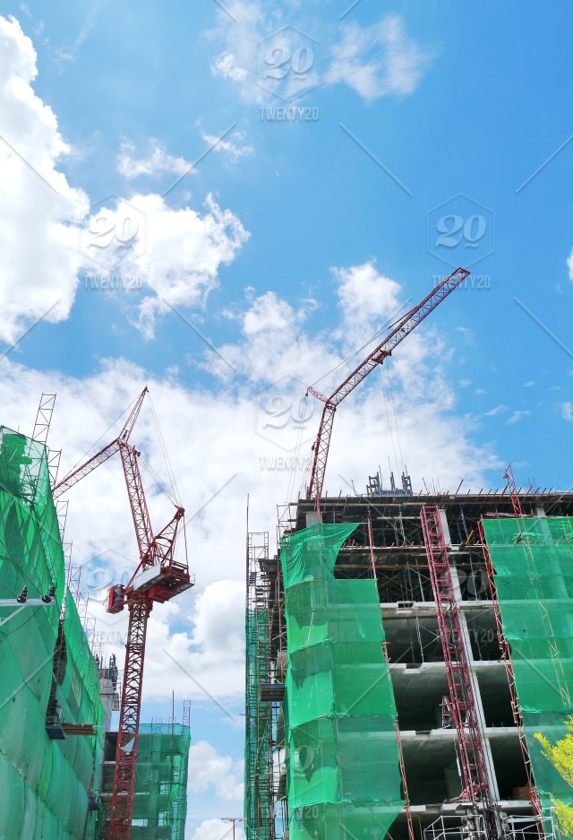 Construction With Crane Blue Sky Background