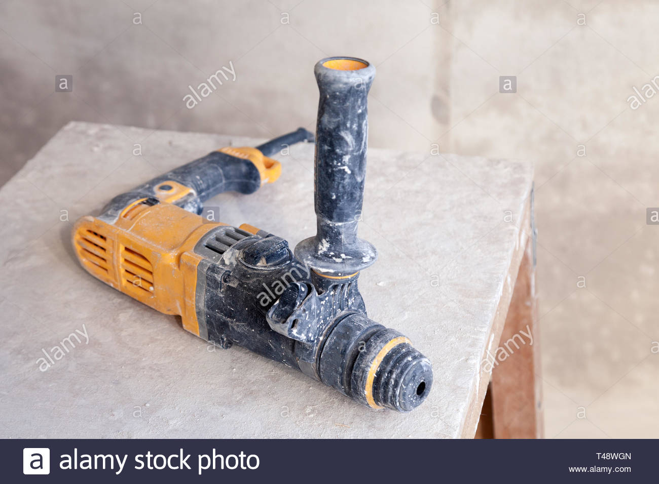 Closeup Dusty Building Tool Drill On The Wooden Scaffolding