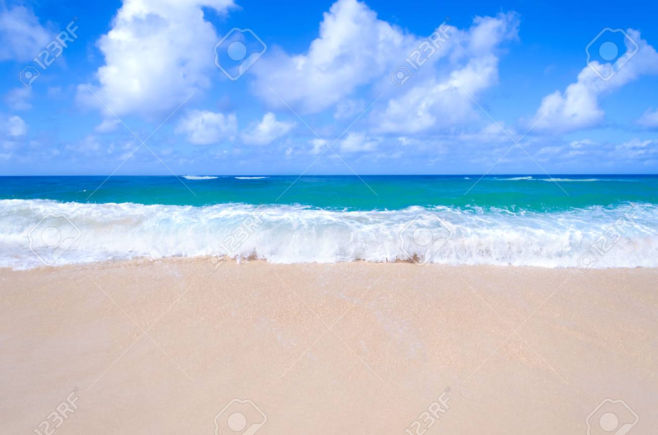 Sandy Beach Background Next To Ocean Hawaii Kauai Stock Photo